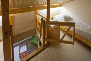 Postel nebo postele na pokoji v ubytování Lapland Hotels Sirkantähti