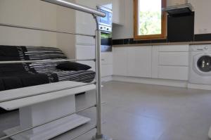 Kuchyň nebo kuchyňský kout v ubytování Gîte dans maison Quercynoise