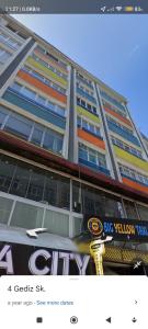a large building with a car parked in front of it at TWO ROOMS WITH KITCHEN in Istanbul