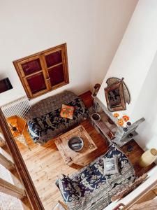 an overhead view of a living room with a couch at PANOS PALACE in Pramanta