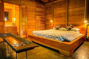 Voodi või voodid majutusasutuse Hamadryade Lodge toas