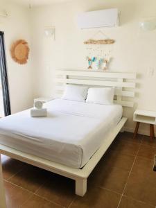 Postel nebo postele na pokoji v ubytování Hotel Boutique Pachamama