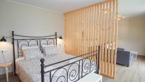 Ένα ή περισσότερα κρεβάτια σε δωμάτιο στο Holidays en Arenys de Mar y Montaña