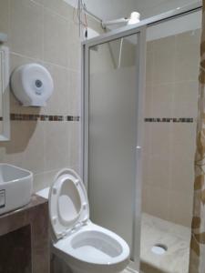 Koupelna v ubytování Mi Hotel Club