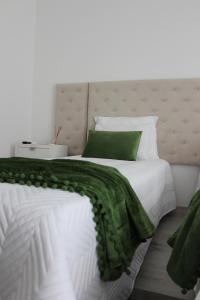 Letto o letti in una camera di ArouceHostel