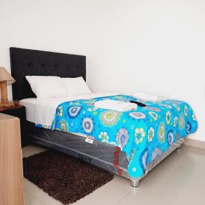 En eller flere senge i et værelse på Hostal Brisa Marina