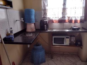 Dapur atau dapur kecil di Sobrado aconchegante +20 gambar