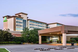 a rendering of a hotel with a parking lot at Holiday Inn Louisville East - Hurstbourne by IHG in Louisville