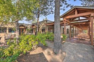 an exterior view of a house with trees at Breathtaking Bend Condo with Resort Amenities! in Bend