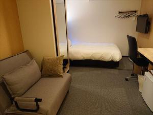 En eller flere senge i et værelse på Green Rich Hotel Kurume Natural Hot Spring Arimamutsumonnoyu