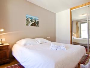 Posteľ alebo postele v izbe v ubytovaní Charmant duplex au cœur de Chamonix avec terrasse, wifi et parking - FR-1-343-183