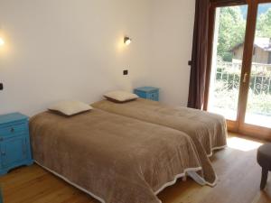 Postel nebo postele na pokoji v ubytování Appartement Chamonix-Mont-Blanc, 3 pièces, 6 personnes - FR-1-343-187