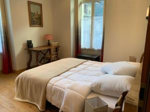 Posteľ alebo postele v izbe v ubytovaní Appartement 4 étoiles au cœur de Chamonix, 3 chambres, proche musée Alpin, parking, WiFi inclus - FR-1-343-186