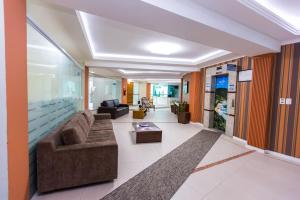 Μια τηλεόραση ή/και κέντρο ψυχαγωγίας στο Apartamento em Prédio com Vista encantadora