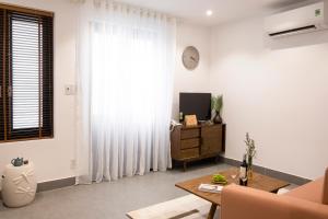 Televisyen dan/atau pusat hiburan di Quang Vinh Apartment and Hotel Hoi An