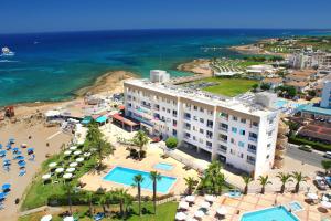 an aerial view of a hotel and the beach at Pola Costa Beach Hotel Apts - Adults Only in Protaras