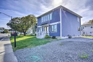 een blauw huis aan de kant van een straat bij Long Branch Getaway Grill, 1 Block to Beach! in Long Branch