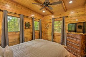 a bedroom with a bed and a ceiling fan at Clayton Retreat with Spacious Deck and Mtn Views! in Clayton
