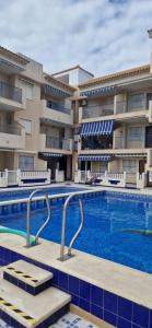 Bazén v ubytovaní Apartamenty Deluxe - Los Naufragos -Torrevieja Costa Blanca alebo v jeho blízkosti