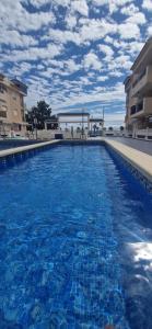Bazén v ubytovaní Apartamenty Deluxe - Los Naufragos -Torrevieja Costa Blanca alebo v jeho blízkosti