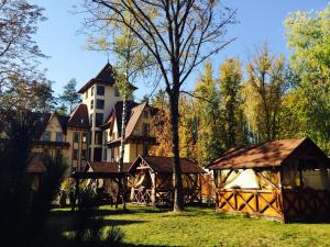 a large building with a gazebo in front of it at Hotel Krakow in Kyiv