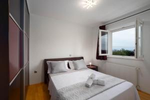 Postel nebo postele na pokoji v ubytování Casa della Cava + 24 fotografií