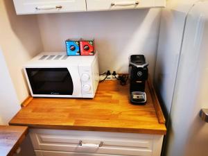A kitchen or kitchenette at Amio Apartment - next to M5 Ca Granda