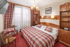 Posteľ alebo postele v izbe v ubytovaní Ski & Wellness Residence Družba + 37 fotografií