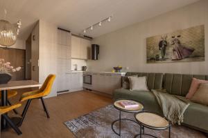 Kuchyňa alebo kuchynka v ubytovaní Glow Apartments, Gdańsk Śląska 12