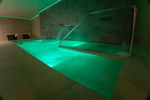 Bazén v ubytovaní OIKOS APARTAMENTOS TURÍSTICOS alebo v jeho blízkosti