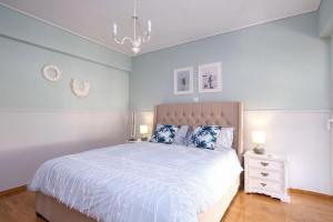 Posteľ alebo postele v izbe v ubytovaní Beach luxe in Glyfada, Athens riviera by GHH