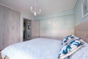 Posteľ alebo postele v izbe v ubytovaní Beach luxe in Glyfada, Athens riviera by GHH
