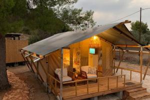 a gazebo with two chairs and a tent at African Safari Canvas Lodge Tent Sea View in Kranidi