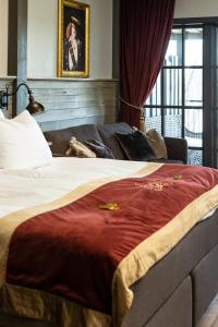 Säng eller sängar i ett rum på Daftö Resort