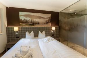 Letto o letti in una camera di Das Lindtal - Appartements