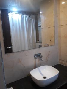Koupelna v ubytování Hotel Crimson Palace