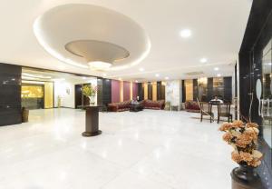 Posezení v ubytování Hotel Crimson Palace