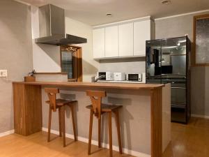 Η κουζίνα ή μικρή κουζίνα στο Yuhike House Misorano