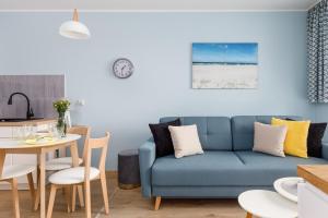 Posezení v ubytování Apartments Nad Parsętą Młyńska by Noclegi Renters