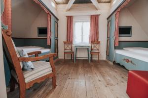 TV a/nebo společenská místnost v ubytování Boutique Hotel am Rathaus - Reblaus