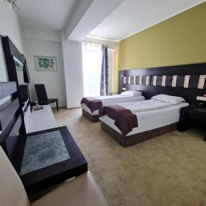 Postel nebo postele na pokoji v ubytování Hotel Sydney + 37 fotografií