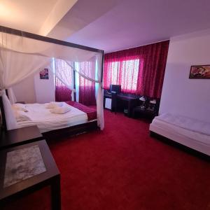 Postel nebo postele na pokoji v ubytování Hotel Sydney