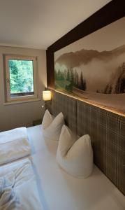 Letto o letti in una camera di Das Lindtal - Appartements