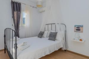 Łóżko lub łóżka w pokoju w obiekcie Uno Luxury Apartment with Sea view