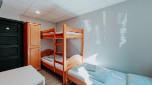 Posteľ alebo postele v izbe v ubytovaní Hostel Filip