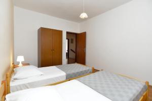 Posteľ alebo postele v izbe v ubytovaní Apartment Prostin 1168