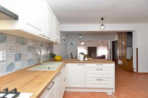 Kuchyňa alebo kuchynka v ubytovaní Apartment Prostin 1168