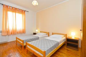 Posteľ alebo postele v izbe v ubytovaní Apartment Prostin 1168