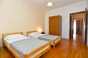 Posteľ alebo postele v izbe v ubytovaní Apartment Prostin 1168