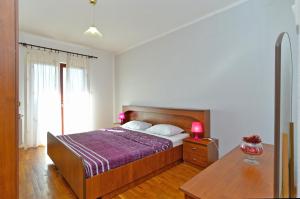 Posteľ alebo postele v izbe v ubytovaní Apartment Prostin 1168